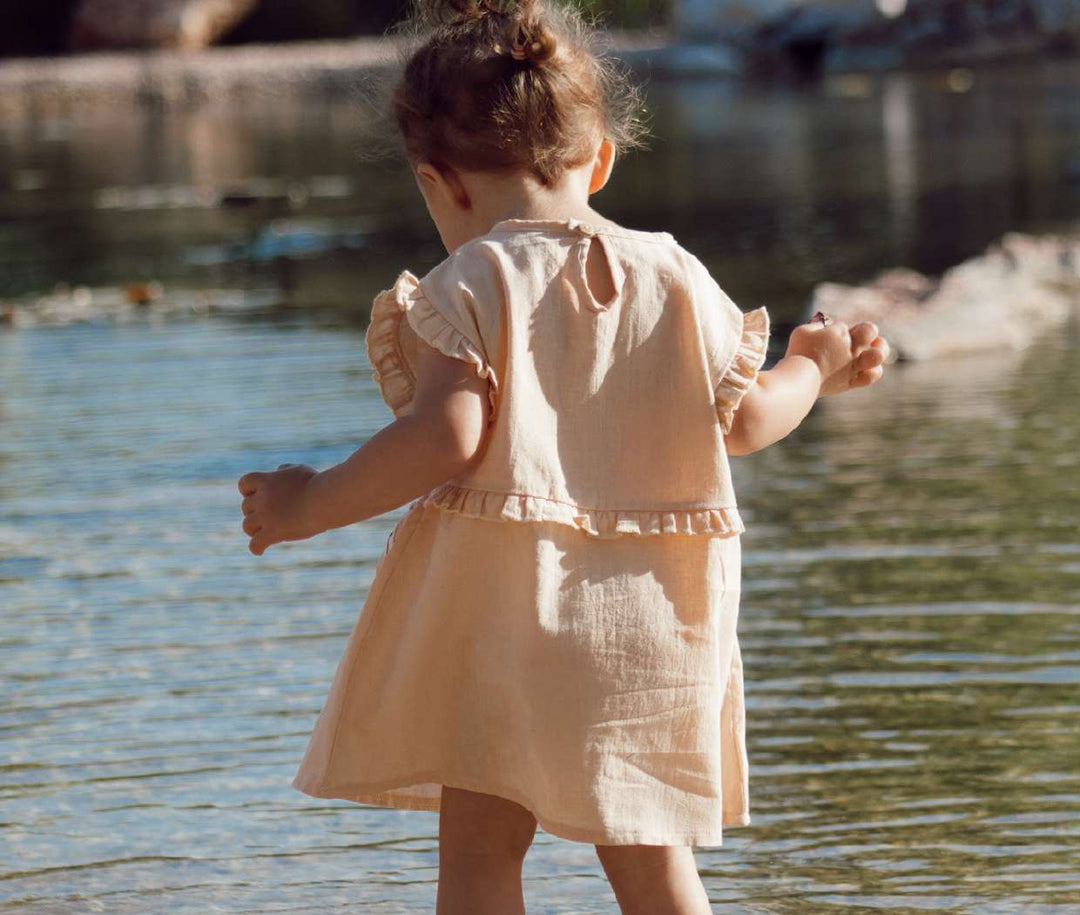 IVORY CREAM ‘FLAMINGO SURFING’ DRESS