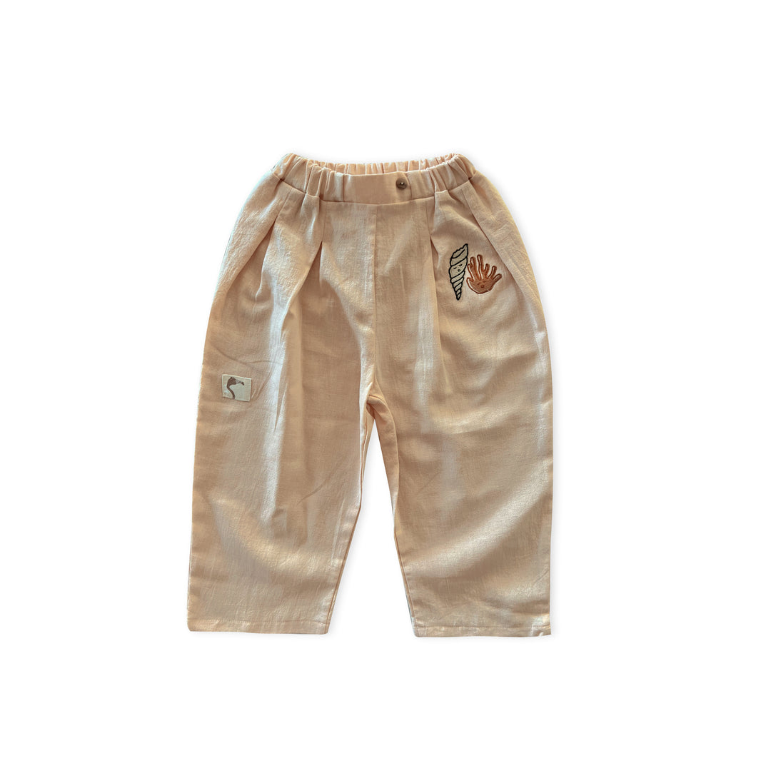 IVORY CREAM ’SHELL AND CORAL’ PLEATED WOVEN TROUSERS