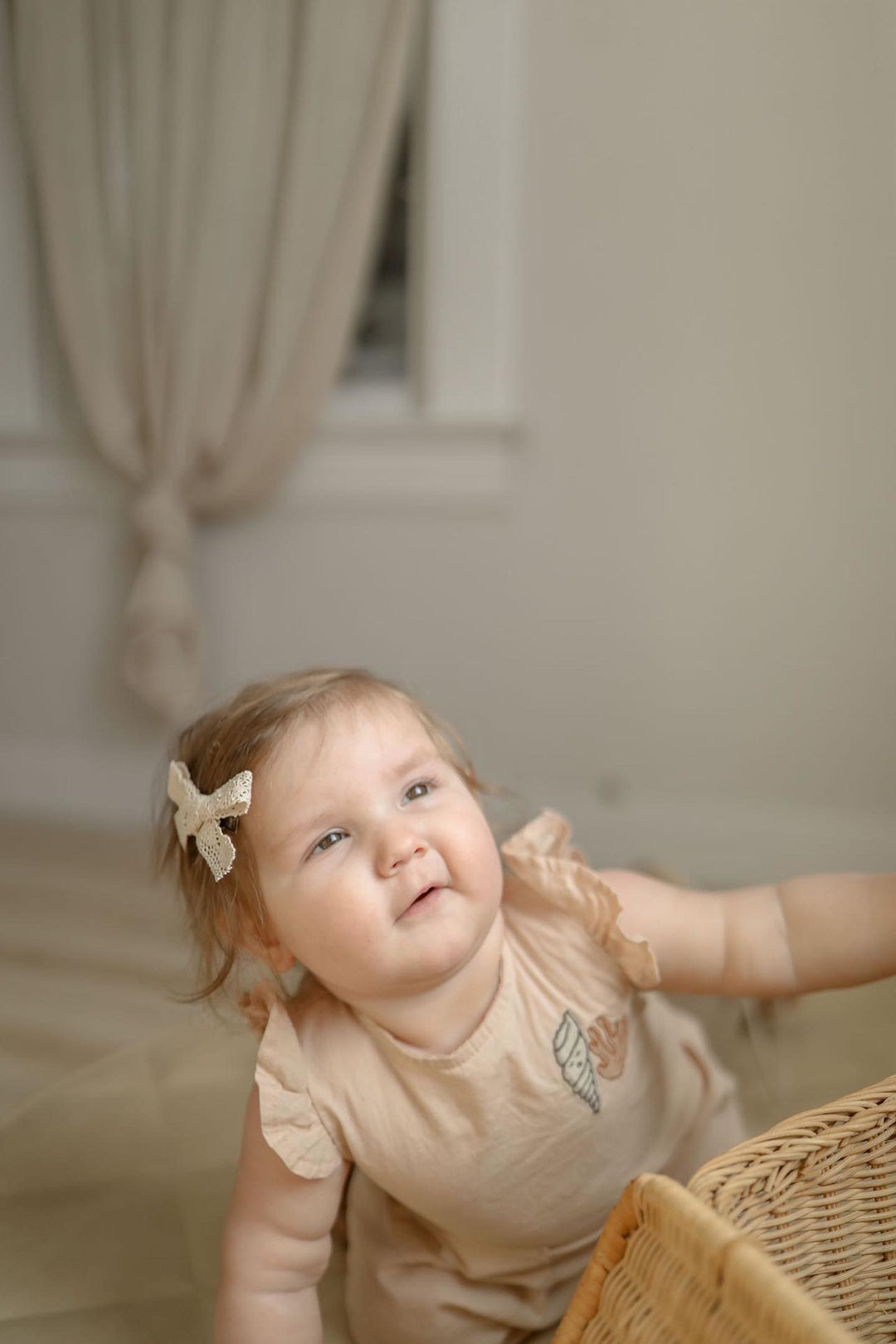 IVORY CREAM ’SHELL AND CORAL’ PLEATED WOVEN ROMPER