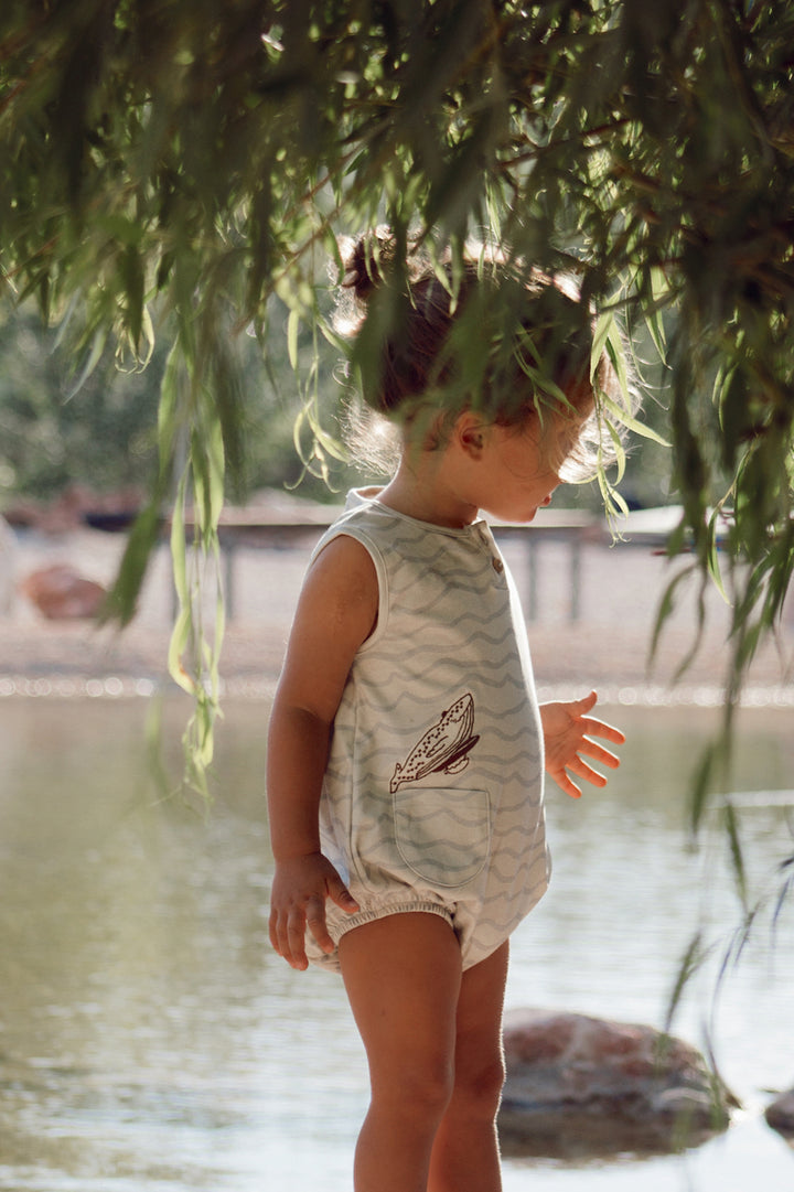 ORGANIC BLUE WAVES ‘SURFING WHALE’ BUBBLE ONESIE