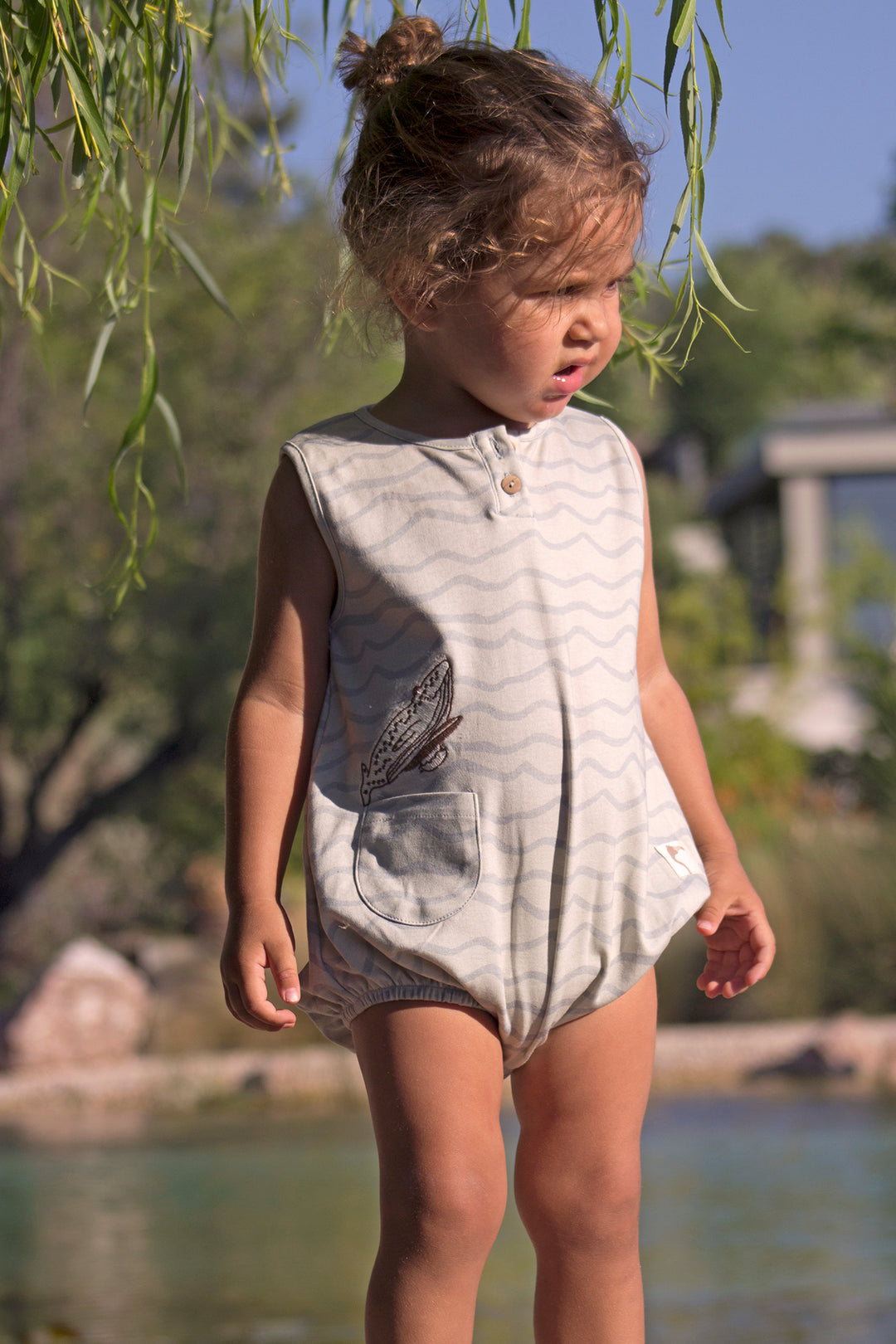 ORGANIC BLUE WAVES ‘SURFING WHALE’ BUBBLE ONESIE